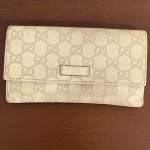 Gucci Guccissima Embossed Leather Wallet